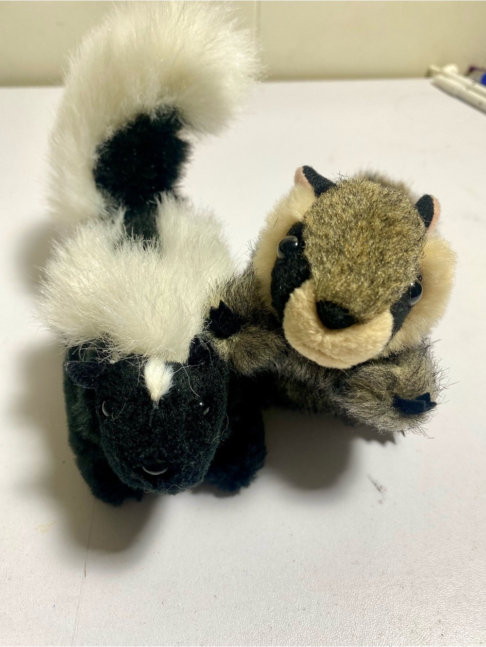 Folkmanis Mini Raccoon & Skunk Finger Puppet Set